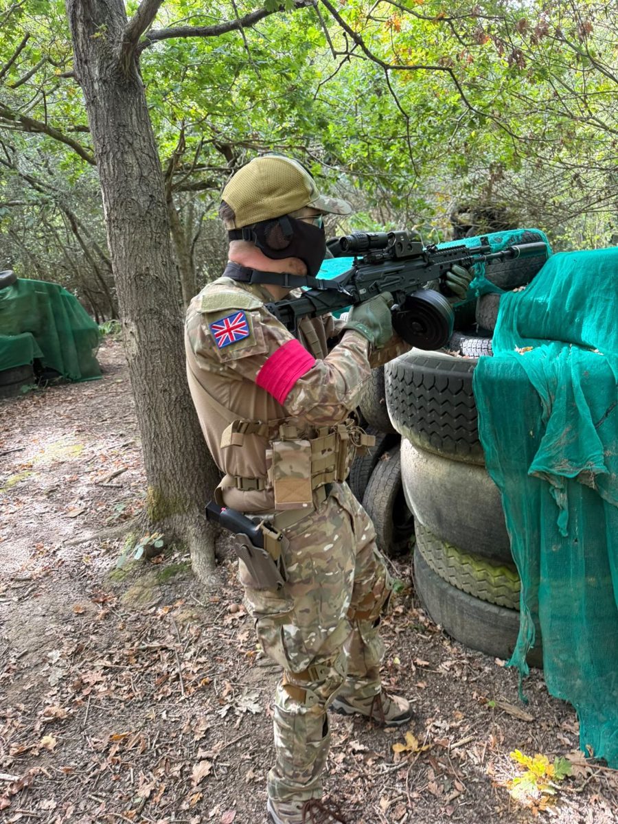 Greg McCallum in kit, playing airsoft in woodland